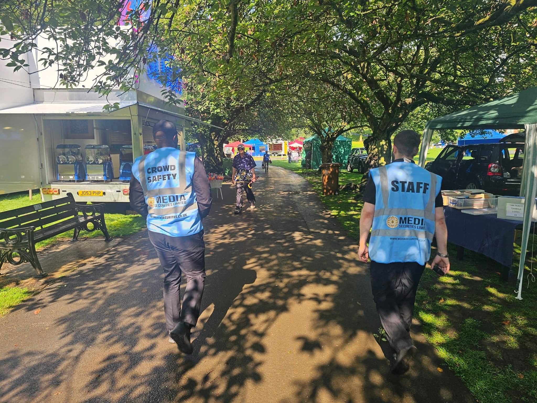 Crowd safety officers patrolling a community event